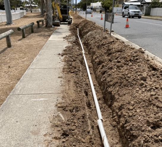 Pipelines Installing Along The Sidewalk — Fibre Optic Installation in Brisbane, QLD