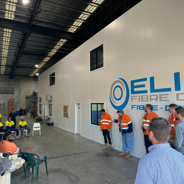 Company Employees Having Meeting Inside The Warehouse — Fibre Optic Installation in Logan, QLD