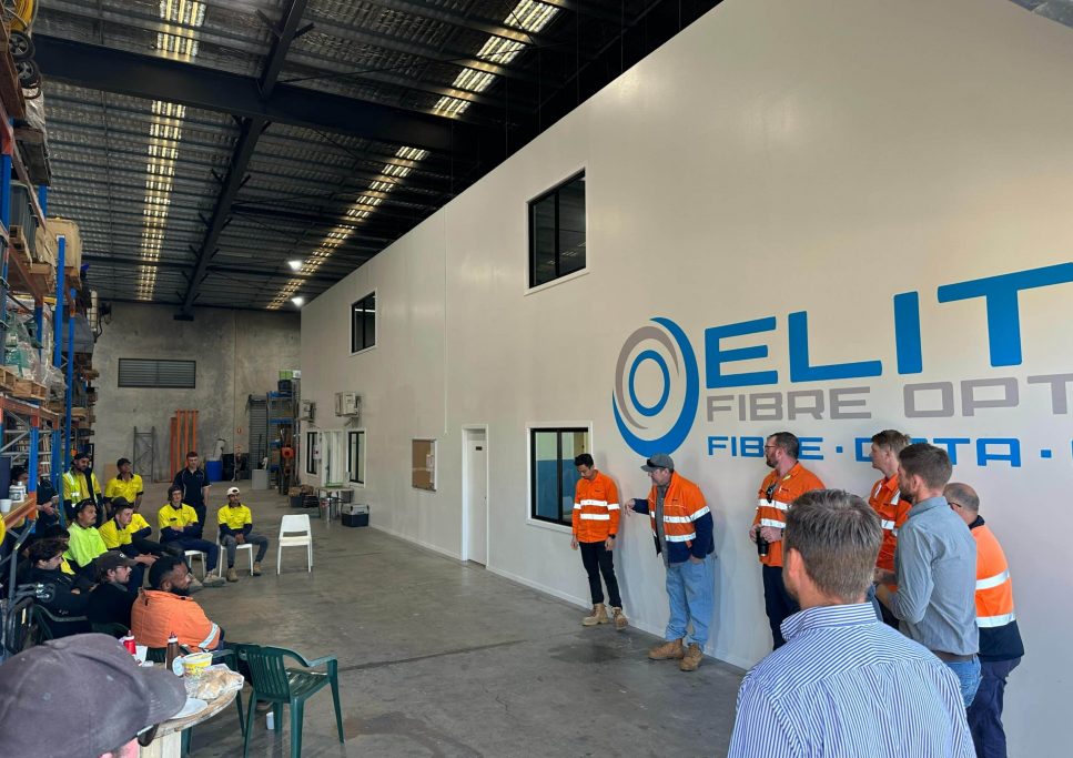Company Employees Having Meeting Inside The Warehouse — Fibre Optic Installation in Logan, QLD