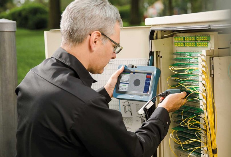 technician checking a cable line