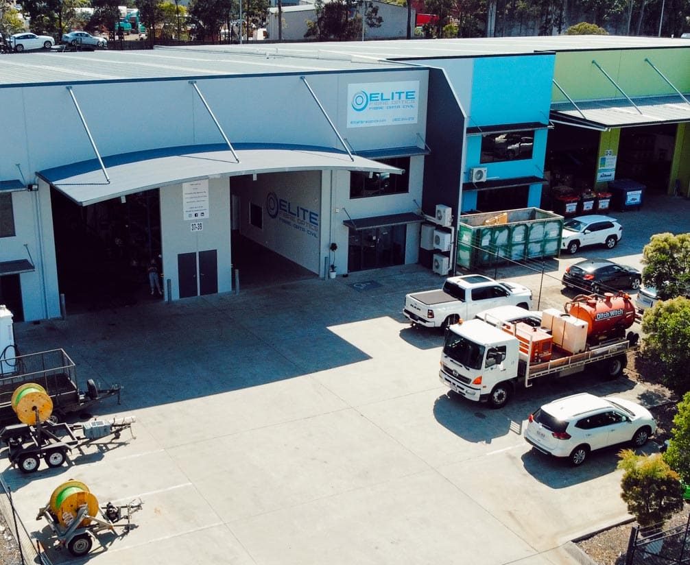 A Building with Cars Parked Outside — Fibre Optic Installation in Brisbane, QLD